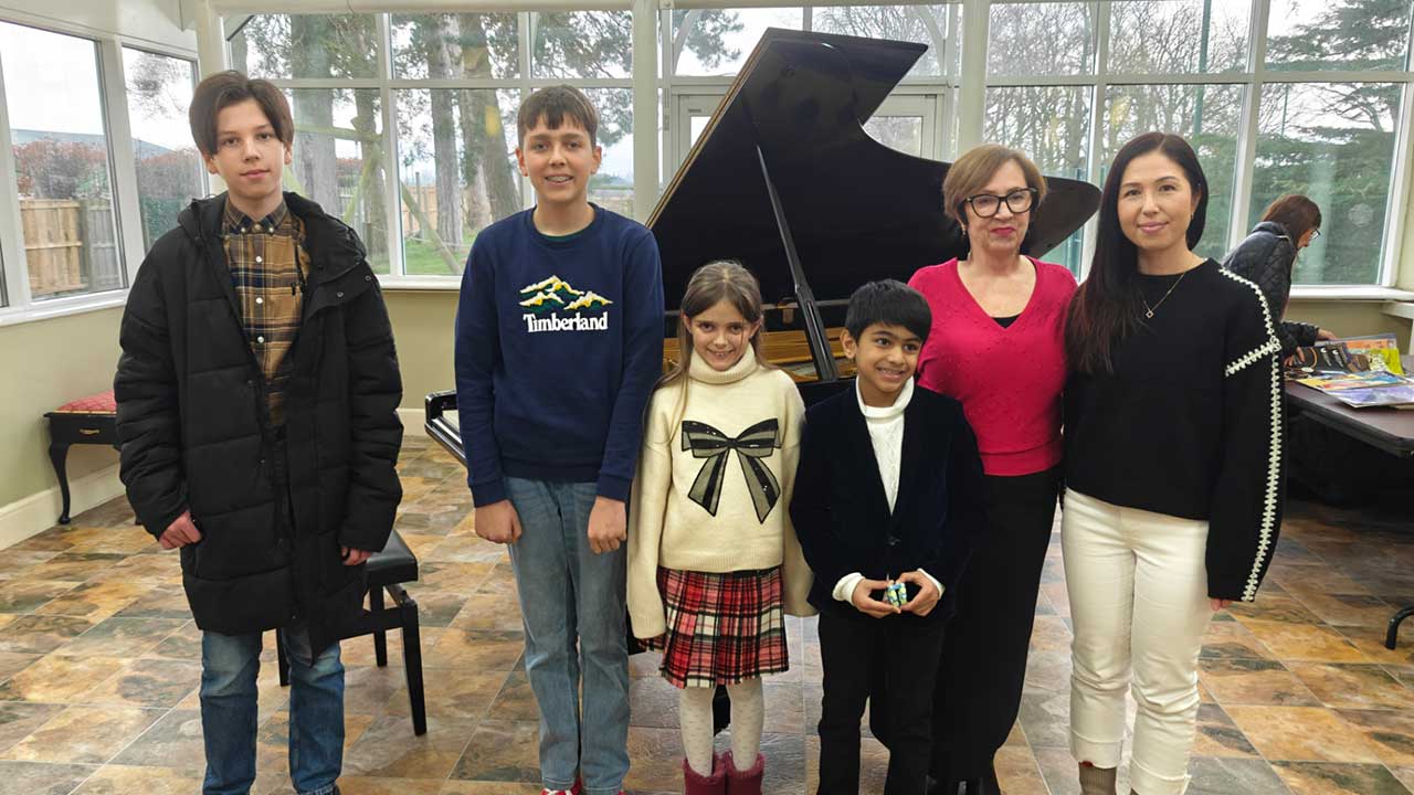 Anna and pupils at Positivelt Piano Club - Feb 2025