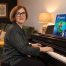 Anna Peszko at a Kawai digital piano with the ABRSM Grade 3 Piano Exam Pieces 2027–2028 book.