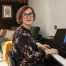 Anna Peszko at a Kawai digital piano with the ABRSM Grade 7 Piano Exam Pieces 2027–2028 book.