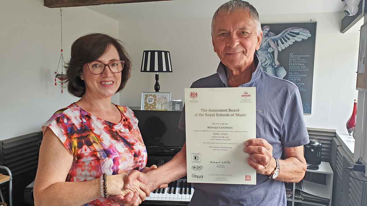 Anna Peszko presenting ABRSM merit certificate