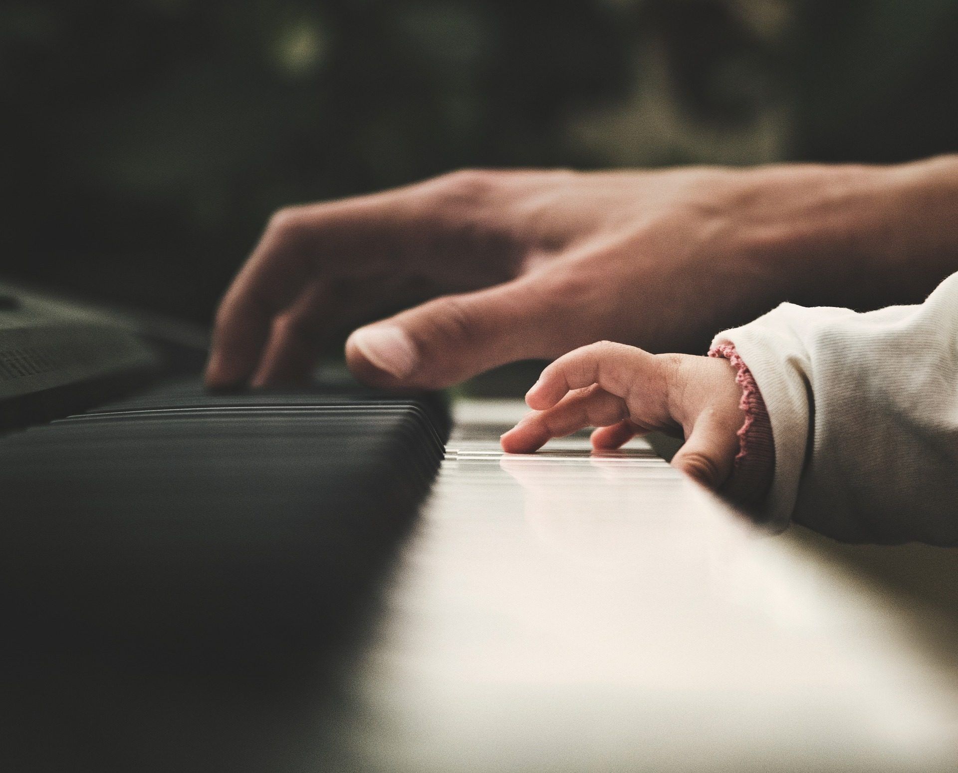Parent and child at the piano